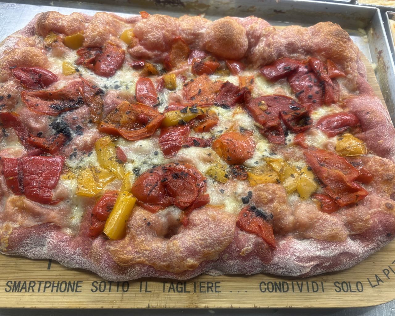 Pizza in pala tradizionale alla Pizzeria Da Alex