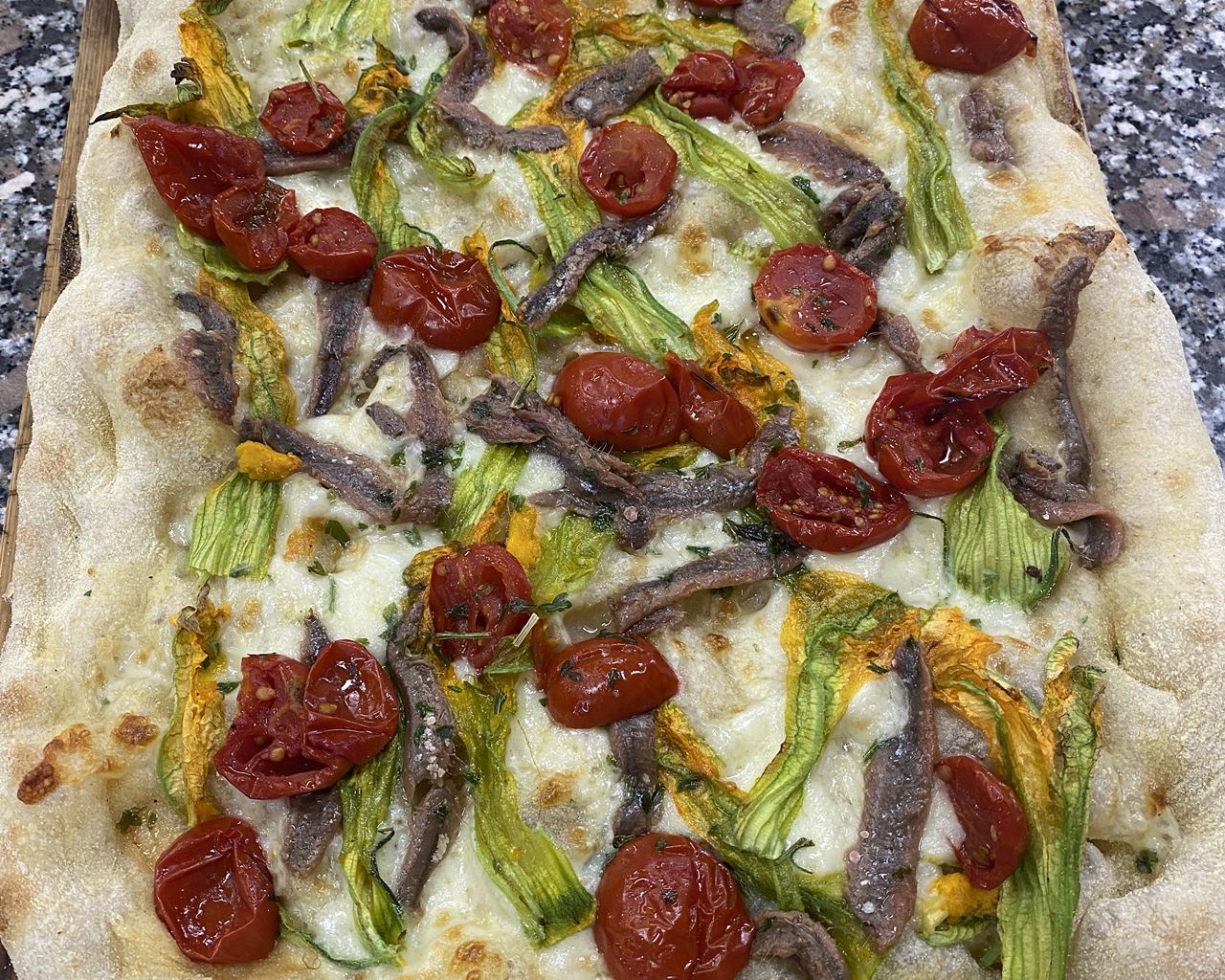 Pizza in pala artigianale da Pizzeria Da Alex a Verona